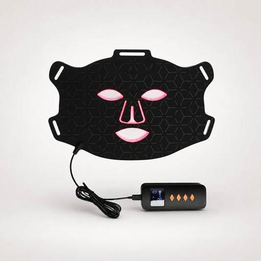 Professional LED red light therapy face mask with handheld controller on light background